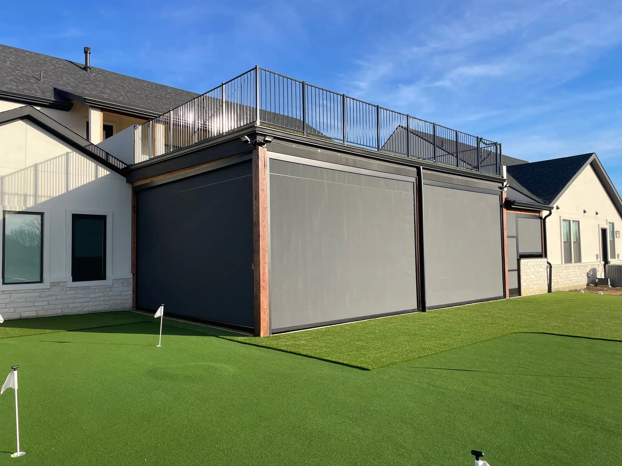 V-Track screen descending from hidden housing